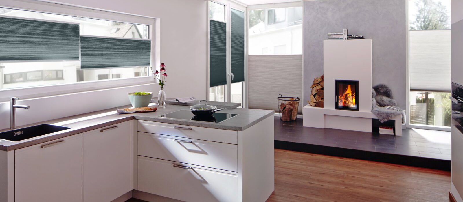 Top down bottom up silk dim out blue grey Duette® shades in kitchen